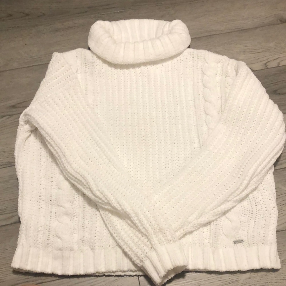 white turtle neck knit sweater